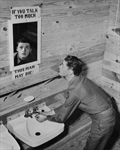 Soldier Looking in Bathroom Mirror with a Reminder to Practice Discretion, "If You Talk Too Much This Man May Die", Camp Hood, Texas, USA, Office of War Information, January 1943