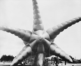 Tail View of Barrage Balloon as it is Slowly Raised from Ground, Camp Tyson, Tennessee, USA, Office of War Information, early 1940's