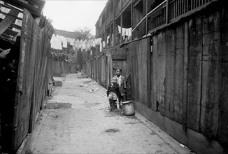 Two Young Boys in Alley, Washington DC, USA, Carl Mydans for U.S. Resettlement Administration, July 1935