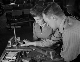 Shop Supervisor George Cole Explaining Testing Processes to Edith Krause, as this Razor Factory was Sub-Contracted for Production of War Tools, Boston, Massachusetts, USA, Howard R. Hollem for Office ...