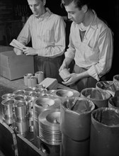 Two Workers Packaging finished Pistons Scheduled to be used in Army Jeeps, Manufactured at Aluminum Factory Converted to War Production, Aluminum Industries, Inc., Cincinnati, Ohio, USA, Alfred T. Pal...