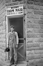Farmer Standing at Office of Farm Manager, Irwinville Farms Project, Irwinville, Georgia, USA, John Vachon for Farm Security Administration, May 1938