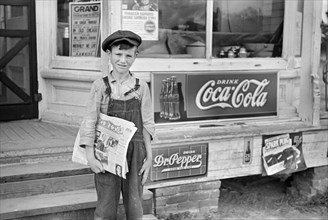 Newsboy Selling 'Grit', Irwinville Farms, Georgia, USA, John Vachon for Farm Security Administration, May 1938