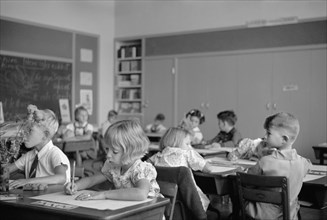 Children Drawing at Desks in Classroom, Greenhills, Ohio, USA, a Greenbelt Community Constructed by U.S. Department of Agriculture as Part of President Franklin Roosevelt's New Deal, John Vachon for U...