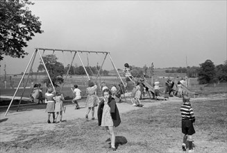 Children Playing at School Playground, Greenhills, Ohio, USA, a Greenbelt Community Constructed by U.S. Department of Agriculture as Part of President Franklin Roosevelt's New Deal, John Vachon for U....