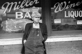 Farmer Standing in front of Bar, South Omaha Nebraska, USA, John Vachon for Farm Security Administration, November 1938