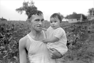 Father and Infant Daughter, Homesteader, Tygart Valley Homesteads, West Virginia, USA, John Vachon for U.S. Resettlement Administration, June 1939