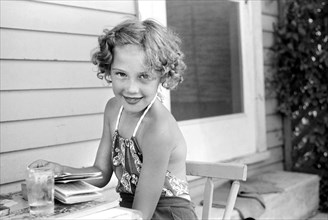 Smiling Young Girl, Child of Homesteader, Tygart Valley Homesteads, West Virginia, USA, John Vachon for U.S. Resettlement Administration, June 1939