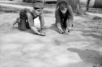 Two Boys Shooting Marbles, Woodbine, Iowa, USA, John Vachon for Farm Security Administration, May 1940