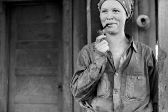 Wife of Ozark Mountains Farmer Smoking Pipe, Missouri, USA, John Vachon for Farm Security Administration, May 1940