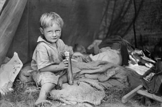 Migrant Child Sitting in Tent Home, Berrien County, Michigan, USA, John Vachon for Farm Security Administration July 1940