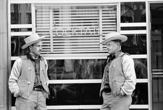 Two Cowboys Dressed Alike in Front of Bar, Billings, Montana, USA, Arthur Rothstein for Farm Security Administration, July 1939