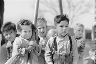 Portrait of Young Boys and Girls at Playground, Children of Migratory Workers, Weslaco, Texas, USA, Arthur Rothstein for Farm Security Administration, January 1942
