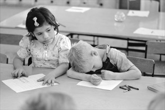 Two Children of Migratory Workers in Elementary School Classroom at FSA Camp, Weslaco, Texas, USA, Arthur Rothstein for Farm Security Administration, February 1942