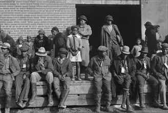 African-American Flood Refugees Wearing Identification Tags after Registration in the Flood Refugee Camp, Forrest City, Arkansas, USA, Edwin Locke for U.S. Resettlement Administration, February 1937