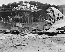 Damaged Hangar No. 11 after Imperial Japanese Navy Air Service Attack, Hickam Field, Pearl Harbor Hawaii, Office of Emergency Management, December 7, 1941