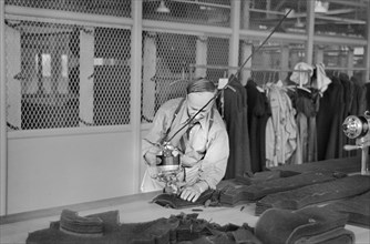 Isadore Kessler, one of the Cutters at the Cooperative Garment Factory at Jersey Homesteads, Hightstown, New Jersey, USA, Russell Lee, U.S. Resettlement Administration, November 1936