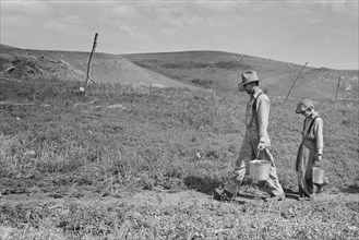 William Huravitch and Son Carrying Water to their Home during Drought, Water Source is about a Half Mile Away, Williams County, North Dakota, USA, Russell Lee, U.S. Resettlement Administration, Septem...