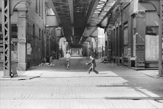 Alley and Elevated Train Tracks, Chicago, Illinois, USA, John Vachon, Farm Security Administration, July 1940