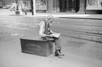 Man Waiting for Street Car, Chicago, Illinois, USA, John Vachon, Farm Security Administration, July 1940