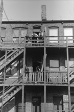 Rear View of Apartment House with Wood Staircase, South Side, Chicago, Illinois, USA, Russell Lee, Farm Security Administration, April 1941