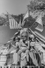 Patriotic Children on Float during Fourth of July Parade, Vale, Oregon, USA, Russell Lee, Farm Security Administration, July 1941