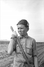 Boy in Vocational Training Class, Gardening, FSA Farmworkers Community, Eleven Mile Corner, Arizona, USA, Russell Lee, Farm Security Administration, February 1942