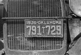 Radiator and License Plate of Oklahoma Cotton Picker's Car, San Joaquin Valley, near Fresno, California, USA, Dorothea Lange, Farm Security Administration, November 1936