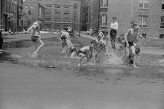 Children Cooling off in Water from Fire Hydrant, Chicago, Illinois, USA, John Vachon, Farm Security Administration, July 1941