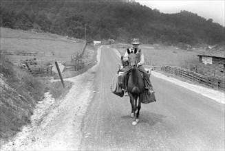 Rural Postman Delivering Mail on Horse, Jackson, Kentucky, USA, Marion Post Wolcott, Farm Security Administration, July 1940
