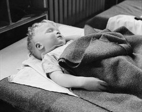Sleeping Boy at Nursery School, Reedsville, West Virginia, USA, Elmer Johnson, Farm Security Administration, April 1935