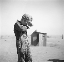 Dust is too Much for Farmer's Son, Cimarron County, Oklahoma, USA, Arthur Rothstein, Farm Security Administration, April 1936