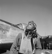 Col. Benjamin O. Davis, Half-length Portrait Wearing Flight Gear, Standing near Airplane at Air Base, Ramitelli, Italy, Toni Frissell, March 1945