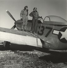 Deputy Group Commander George S. Roberts with photographer Toni Frissell, Portrait Standing on Airplane Wing at Air Base, Ramitelli, Italy, Toni Frissell, March 1945