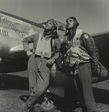 Tuskegee Airmen, Col. Benjamin O. Davis, Commanding Officer, 332nd Fighter Group, Class 42-C (left), Edward C. Gleed, Lawrence, KS, Class 42-K, Group Operations Officer (right), Full-length Portrait, ...