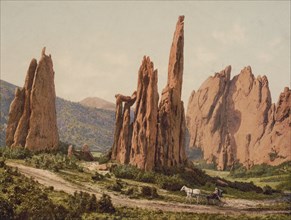 Horse and Buggy Passing by Tall Rock Formations, Cathedral Spires, Garden of the Gods, Colorado Springs, Colorado, USA, William Henry Jackson for Detroit Publishing Company, 1905