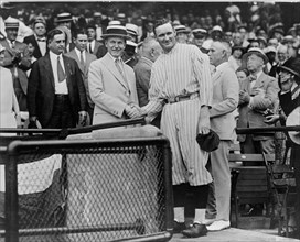 U.S. President Calvin Coolidge Shaking Hands with Washington Senators Pitcher, Walter Johnson, Griffith Stadium, Washington DC, USA, Detroit Publishing Company, 1925
