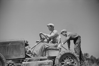 Luke Weldon, Small Farmer, and his son using Ancient Buick as Improvised Tractor. Automobile Purchased in Second-Hand Car Lot for Fifteen Dollars. New Bridgetown, New Jersey, USA, Edwin Rosskam, Farm ...