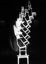 Seven Women of the Chongqing Acrobatic Company Balanced on Stacked Chairs