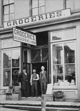 Three Men in Doorway of Grocery Store, USA, circa 1895