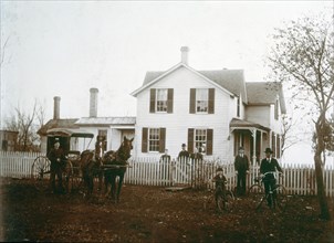 American Home with Horse-Drawn Carriage, Boy with Tricycle and Man with Bicycle, USA, circa 1900