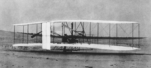Orville Wright with the First Wright Brothers Airplane, Kitty Hawk, North Carolina, USA, circa 1903