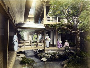Group of Japanese Women in Traditional Clothes Inside Tea House, Tonosawa, Hand Colored Albumen Photograph, circa 1880