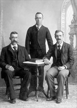Three Men at Table, Studio Portrait, Dunkirk, New York, USA, circa 1893
