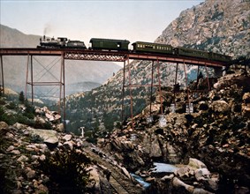 Train Traveling Across Devil's Gate Bridge, Georgetown's Loop, Colorado, USA, circa 1901