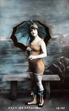 Woman Wearing Bathing Suit and Holding Parasol, Hand Colored Photograph, circa 1900