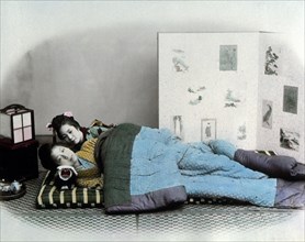 Two Japanese Women Lying in Bed, circa 1870