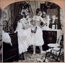 Young Woman Lacing Up Another Woman's Corset, Single Image of Stereo Card, 1897