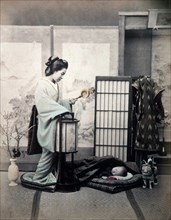Japanese Mother and Sleeping Baby, circa 1880