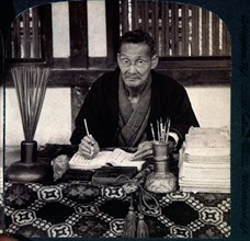 Japanese Fortune Teller Writing Calligraphy, Shinto Temple of Inari, Kyoto, Japan, Single Image of Stereo Card, 1904